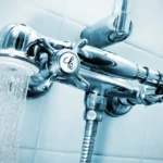 a faucet with running water / Shower Filters: Cost, Benefits, and Drawbacks - What Is a Shower Filter? - Benefits of Using a Shower Filter - Simple Tips to Keep Your Water Clean - ETA Mold Inspection in Florida