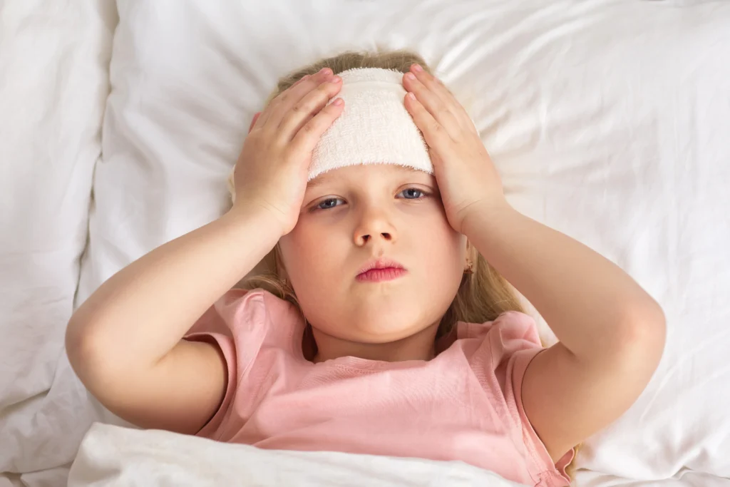 a child facing headache due to mold

