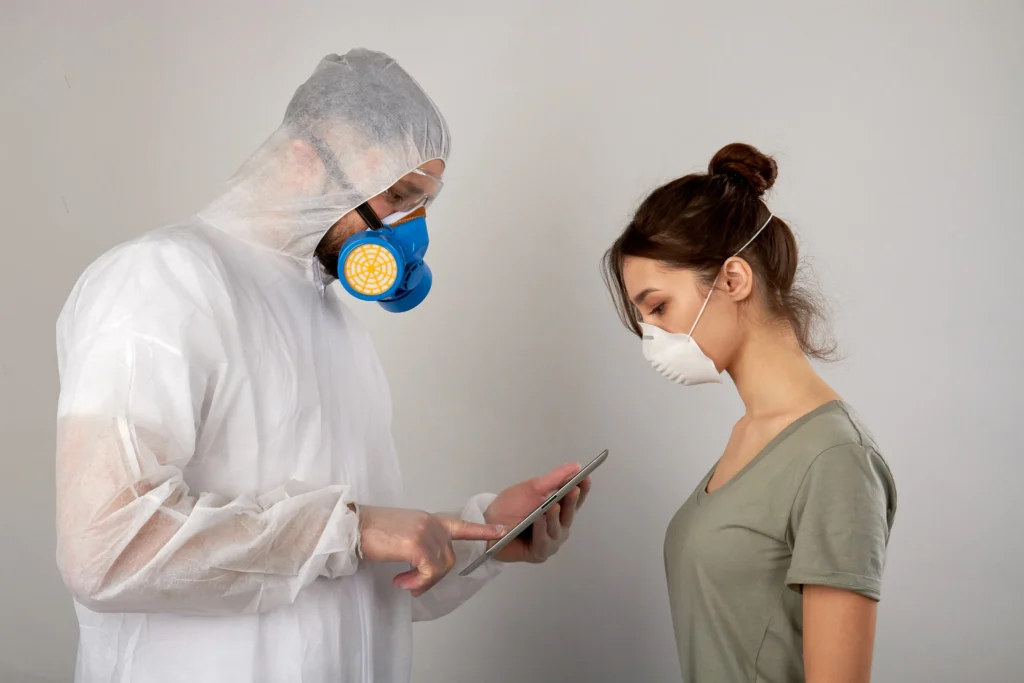 woman consults healthcare worker wearing protective - How Long Does Mold Testing Take?