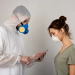 woman consults healthcare worker wearing protective - How Long Does Mold Testing Take?